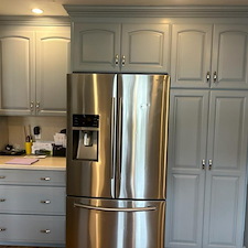 Insurance Repair & Refinishing kitchen Cabinets, New Countertops and Backsplash 0